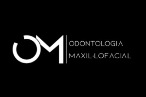 logo de OM Clínica Dental